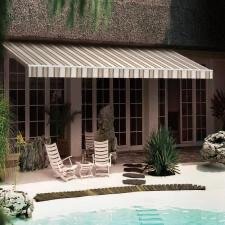 Striped Awning Over Two Chairs